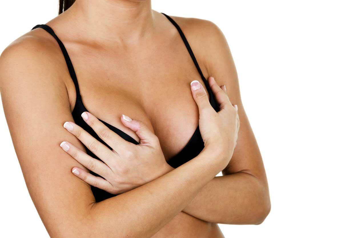 Woman Holding Breasts